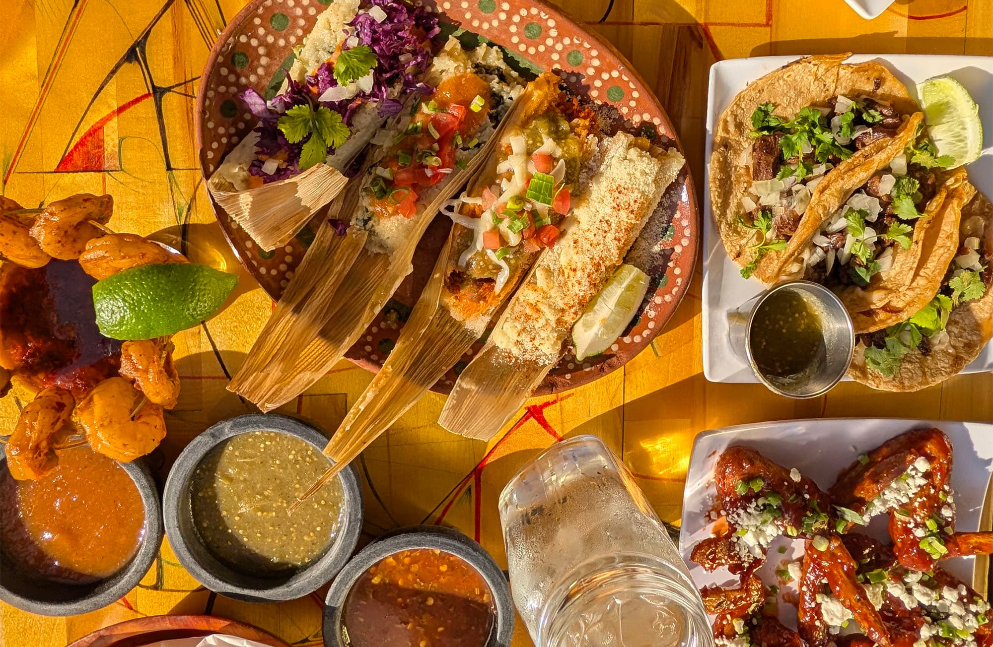 A table spread of Estrella Negra dishes